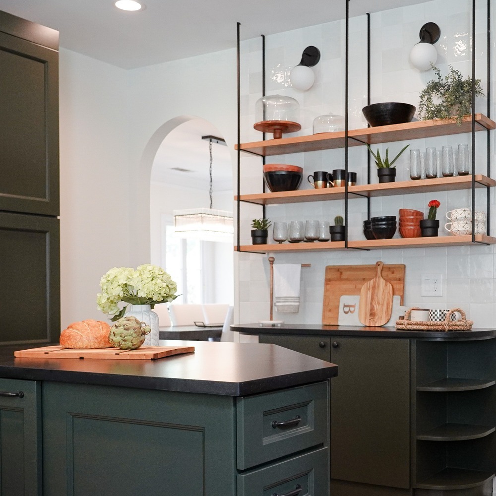 Interior view of a custom kitchen with arched doorway in a Loganville, GA home by Exodus Design Build.