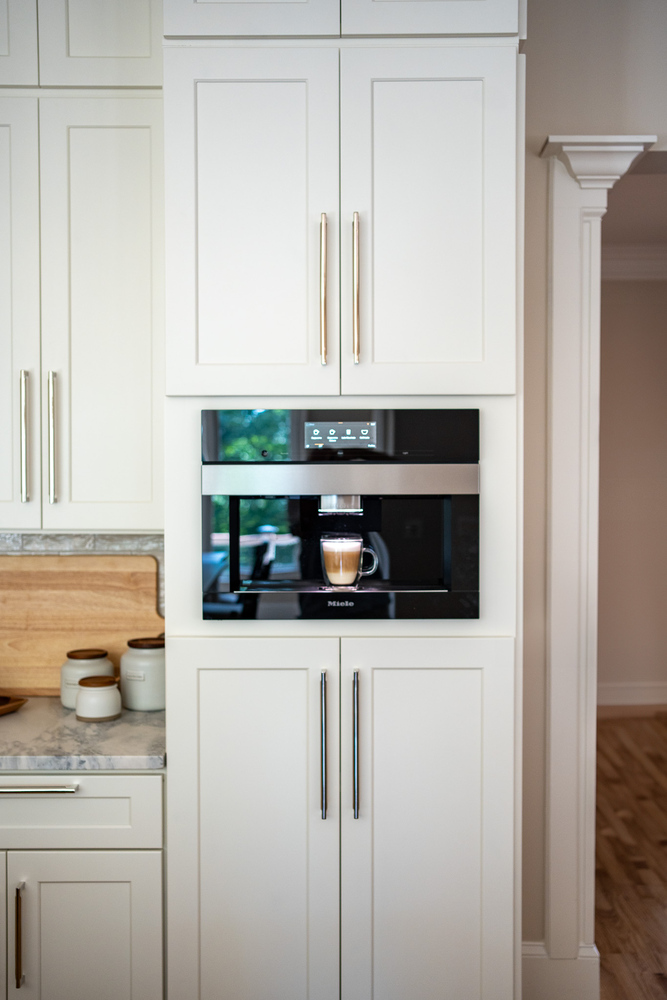 Full-height cabinets and coffee bar area in a custom kitchen by Exodus Design Build in Peachtree Corners, GA.