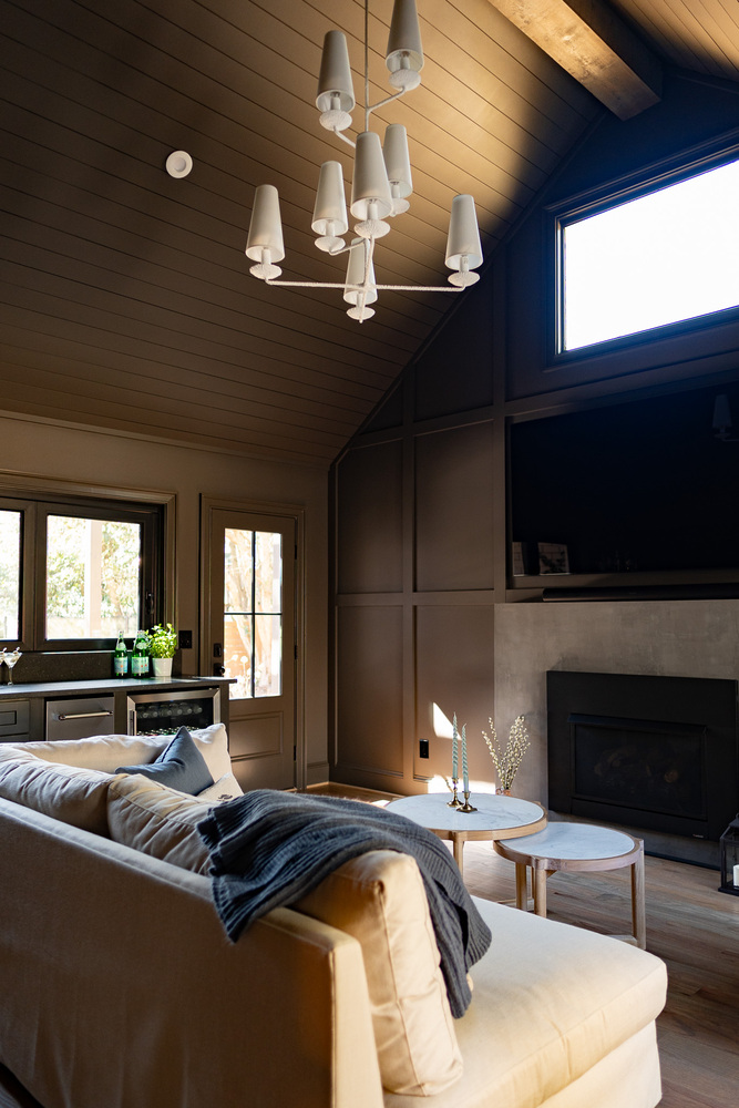 Vaulted ceiling with modern white chandelier in custom home by Exodus Design Build in Auburn, GA